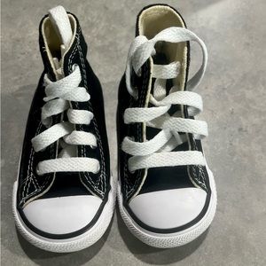 Black and white converse.